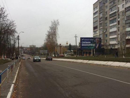 Фото рекламной плоскости по адресу ул. Сосновского, 19-а, в центр