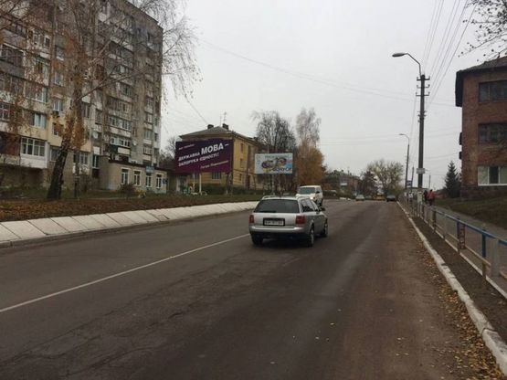 Фото рекламной плоскости по адресу ул. Сосновского, 19-а, из центра