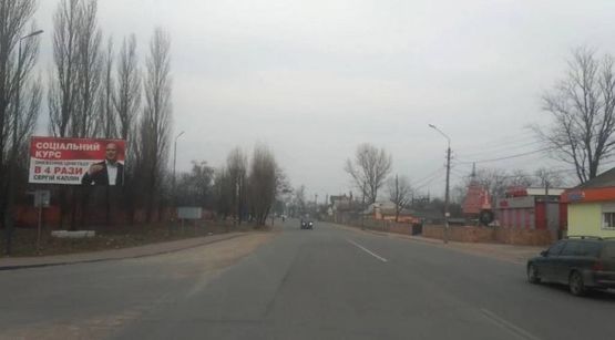 Фото рекламной плоскости по адресу ул. Кемского, 1-б, АЗС ОКО, из центра, в напр. выезда на Киев, "варшавскую" трассу