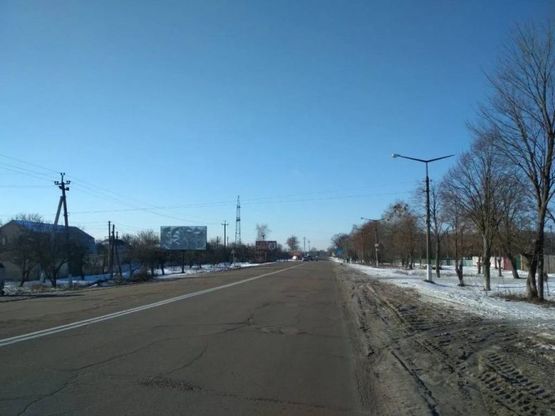 Фото рекламной плоскости по адресу ул. Грушевского, 237, из центра, на выезд из города в напр. Житомира