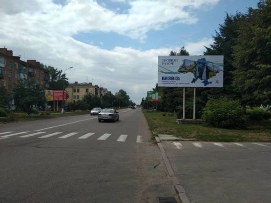 Фото рекламной плоскости по адресу ул. Грушевского, 52, Укрсоцбанк, ощадбанк, из центра, в напр. выезда на Житомир