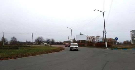 Фото рекламной плоскости по адресу ул. Гагарина, напротив проходной бумажной фабрики, возле моста, в центр