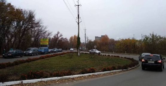 Фото рекламной плоскости по адресу ул. Грушевского, мост, из центра, от рынка, АТБ - 300м