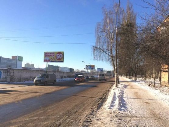 Фото рекламной плоскости по адресу ул. Грушевского, 91 (паркинг ТРЦ "Глобал":"Караван", "Фокстрот", "Макдональдс", "Комфи", "Эльдорадо", "Мультиплекс", "MOYO")