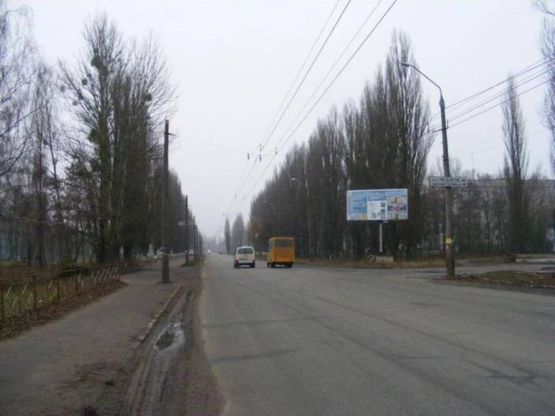 Фото рекламной плоскости по адресу ул. Параджанова, 62 - Металлистов, из центра (ЖЗМК, тамож.терминал, от АЗС ОККО, АЗС КЛО, мет.база АВ Металл Групп)
