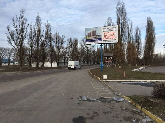Фото рекламной плоскости по адресу ул. Ярмарочная, 11-А, возле АЗС «WOG» (объездная дорога на Полтаву)