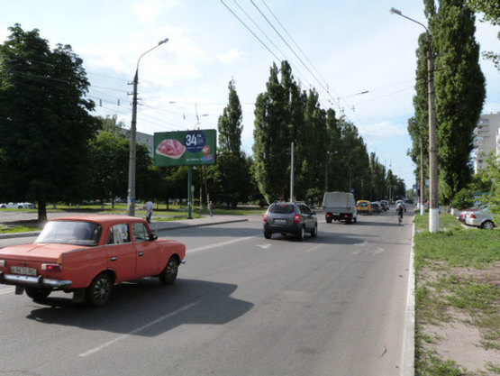 Фото рекламной плоскости по адресу просп. Л.Украинки (просп. 50-лет. Октября), перекрёсток с ул. Керченской, напротив супермаркета «Маркетопт», остановка «Керченская»
