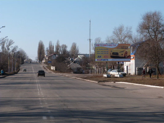 Фото рекламной плоскости по адресу переулок Медовый (переулок Постышева), 213, район АЗС и Кондитерской фабрики «Лукас»