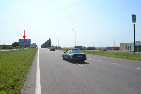 Фото рекламной плоскости по адресу Ростовская трасса-разделитель возле АЗС ОККО 2 (выезд из города)