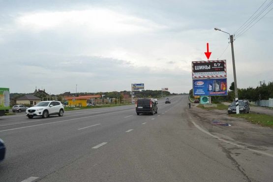 Фото рекламной плоскости по адресу Полтавский шлях-пос.Песочин-ул. Автомобильная напротив двух АЗС (выезд из города)