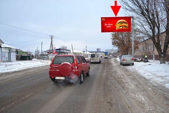 Фото рекламної площини за адресою Мерефа-ул. Днепровская-возле маркета АТБ- флажок№2- в ст Харькова