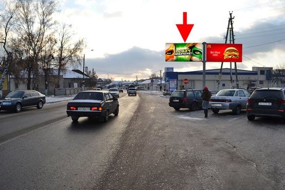 Фото рекламной плоскости по адресу Мерефа-ул. Днепровская-возле маркета АТБ- левый - в ст. пос. Селекционное