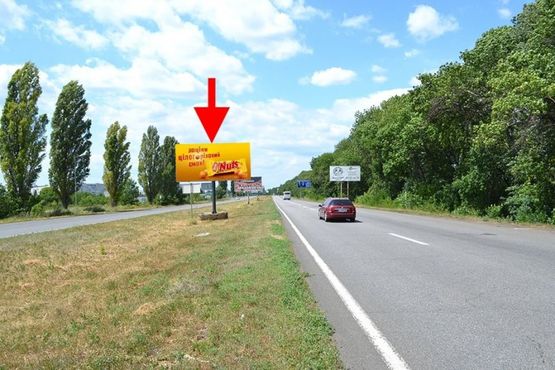 Фото рекламної площини за адресою Московский пр-т - Ростовская трасса возле АЗС ОККО-10- (въезд в город)