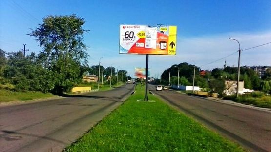 Фото рекламной плоскости по адресу Карпенко-Карого ул., мост (разделитель)