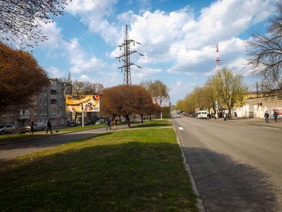 Фото рекламної площини за адресою пр-т. О. Поля вниз (Автодорожній технікум)/пр. Кирова вниз (Автодорожный техникум), поток к пр.Карла Маркса
