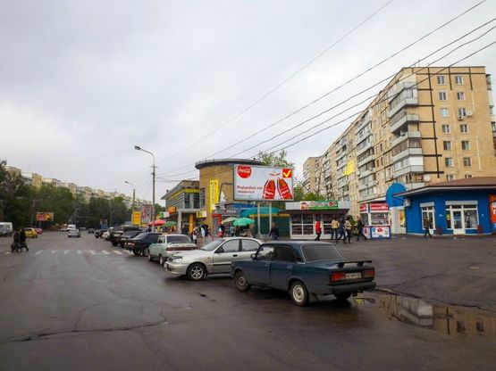 Фото рекламной плоскости по адресу ж/м Перемога, магазин "ПІК"/ж/м Победа, магазин "ПИК" , МакДональдс, Комфи, Адидас