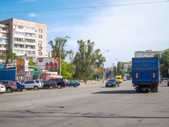 Фото рекламной плоскости по адресу ж/м Перемога, магазин "ПІК"/ж/м Победа, магазин "ПИК" , МакДональдс, Комфи, Адидас