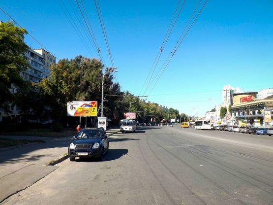 Фото рекламной плоскости по адресу пр-т. Героїв, 12, магазин "Кодак"/пр. Героев, 12, остановка, магазин "Кодак" , МакДональдс, Комфи, Адидас