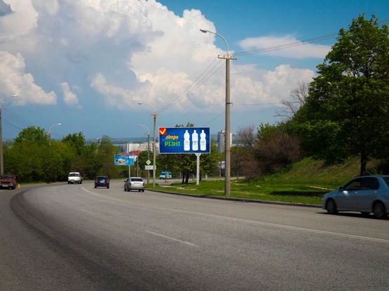 Фото рекламной плоскости по адресу вул. Космічна - вул. Космонавта Комарова/ул. Космическая - ул. Космонавта Комарова