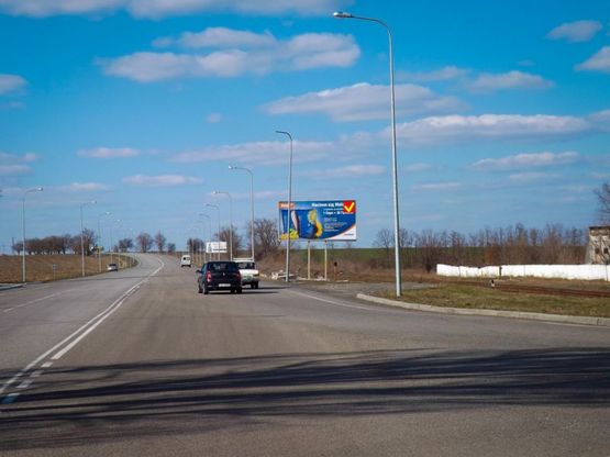 Фото рекламної площини за адресою вул. Яснополянська - траса на Аеропорт/ул. Яснополянская - трасса на Аэропорт