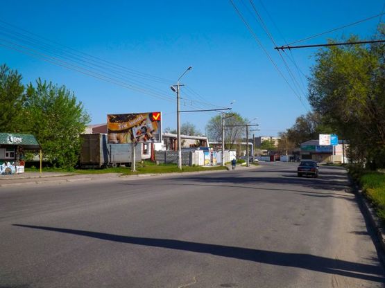 Фото рекламной плоскости по адресу вул. Марії Лисиченко /ул. Героев Гражданской войны, поток движения к пр.Слобожанскому