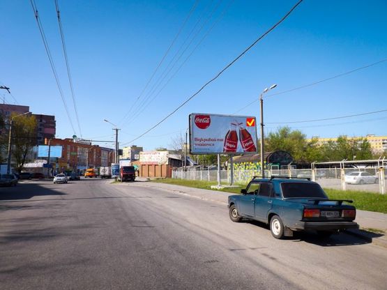 Фото рекламної площини за адресою вул. Марії Лисиченко, автостоянка/ул. Героев Гражданской войны, автостоянка