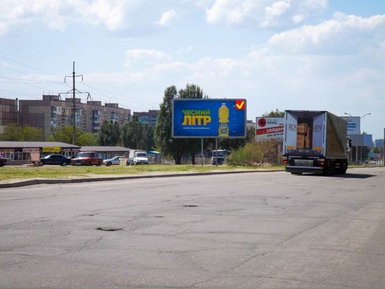 Фото рекламної площини за адресою Донецьке шосе, за ринком "Березинський", в центр/Донецкое шоссе, за рынком "Березинский", в центр