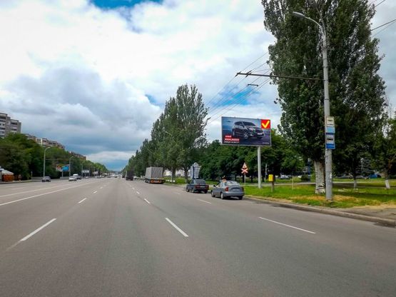 Фото рекламної площини за адресою Запорізьке шосе - вул. Панікахи, а/салон "Porsche"/Запорожское шоссе - ул. Паникахи, а/салон Порше
