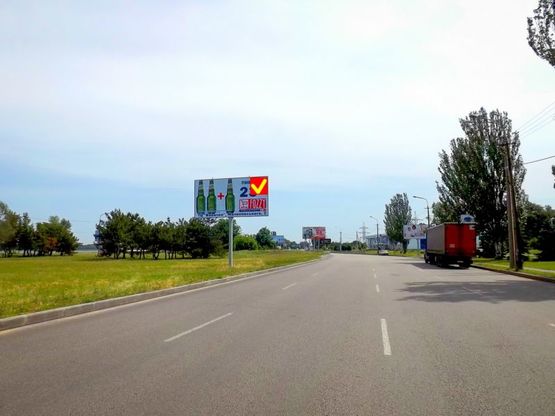 Фото рекламной плоскости по адресу вул. Наб. Заводська, розподілювач," Льодова арена", в центр/ул. Наб. Заводская, разделитель, Ледовая арена, в центр