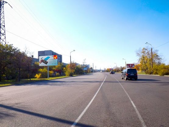 Фото рекламної площини за адресою вул. Наб. Заводська, за залізничним мостом, з центру /ул. Наб. Заводская, за ж/д мостом, из центра, поток движения от Амурского к Кайдакскому мосту