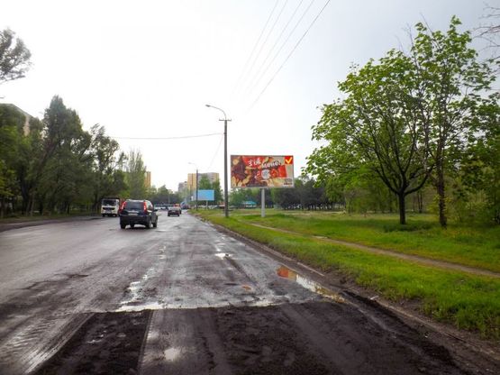 Фото рекламной плоскости по адресу вул. Наб. Перемоги, 130/ул. Наб. Победы, 130, шинный центр Bridgestone, рядом Южный мост