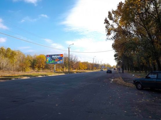 Фото рекламной плоскости по адресу вул. Наб. Перемоги, 130/ул. Наб. Победы, 130, шинный центр Bridgestone, рядом Южный мост