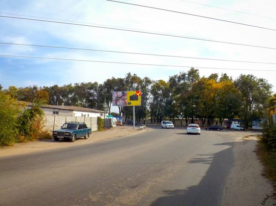 Фото рекламной плоскости по адресу вул. Шинна, 23/ул. Шинная, 23, между ул.ЗапШоссе и пр.Героев Сталинграда, заправка SOCAR, центры ремонта авто, автомагазины