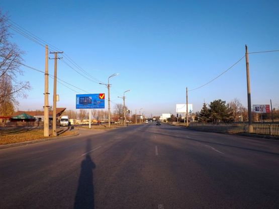 Фото рекламной плоскости по адресу ж/м Червоний Камінь, вул.Наб.Заводська - кафе "Берег" /ж/м Красный Камень , ул.Наб.Заводская - кафе "Берег" картинг центр Гараж