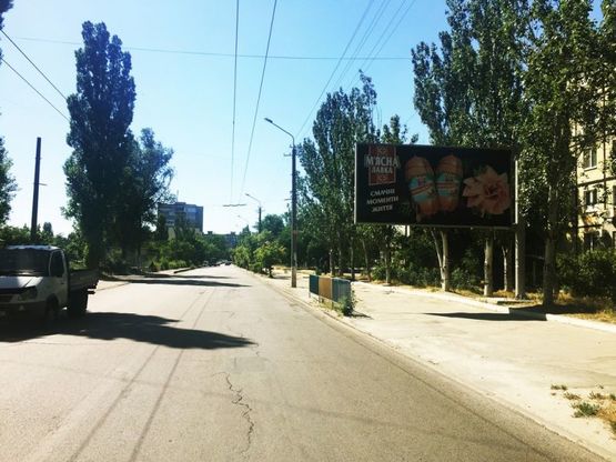 Фото рекламной плоскости по адресу вул.Б.Хмельницкого, 21/ул.Б.Хмельницкого, 21, поток движения от ул.Коссиора к пр.Слобожанский