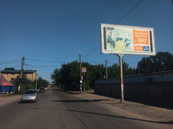 Фото рекламной плоскости по адресу вул.Любарського, з центру (буд.№10)/ул.Белостоцкого, из центра (дом №10)