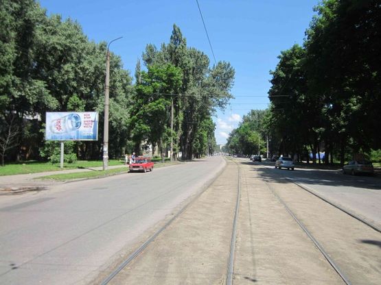 Фото рекламної площини за адресою вул.Б.Хмельницького, 130/ул.Героев Сталинграда, 130, ТЦ Терра, рядом рынок, магазины
