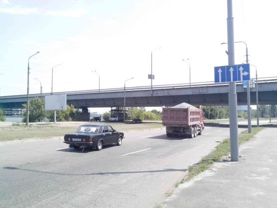 Фото рекламной плоскости по адресу вул.Наб.Перемоги (р-н Південного моста)/ул.Наб.Победы (р-н Южного моста) Южный мост, трансопртная развязка