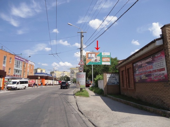 Фото рекламной плоскости по адресу вул. Марії Лисиченко, біля зупинки "Ринок Березинський", з центру/ул. Героев Гражданской войны, возле остановки "Рынок Березинский", из центра