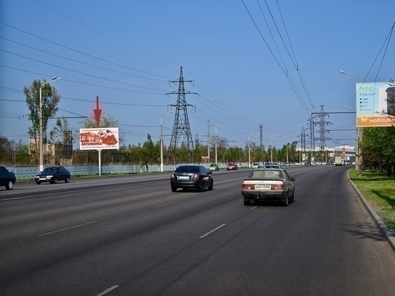 Фото рекламной плоскости по адресу вул. Набережна Заводська, електроопора 243-245, перед заводом Євраз, на стороні заводу/ул. Набережная Заводская, электроопора 243-245, перед заводом ЕВРАЗ, на стороне завода