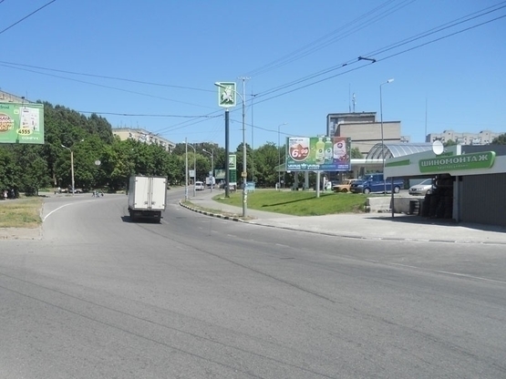 Фото рекламной плоскости по адресу вул. Панікахи (заправка ОККО, вулканізація), до ТРЦ Терра/ул. Паникахи (заправка "ОККО", вулканизация), к ТРЦ "Терра"