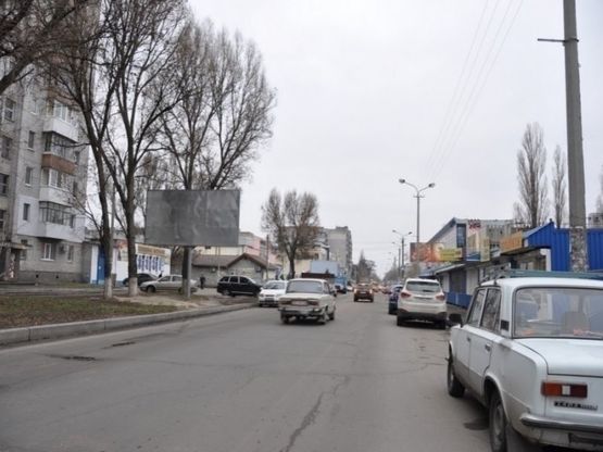 Фото рекламної площини за адресою вул. Калинова, 1, ринок, рух до пр. Слобожанський/ул. Калиновая, 1, рынок, движение к пр. Слобожанскому