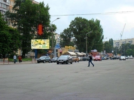Фото рекламної площини за адресою пр. Героїв, 3, перед ринком "Кодак", рух з центру/пр. Героев, 3, перед рынком Кодак, движение из центра