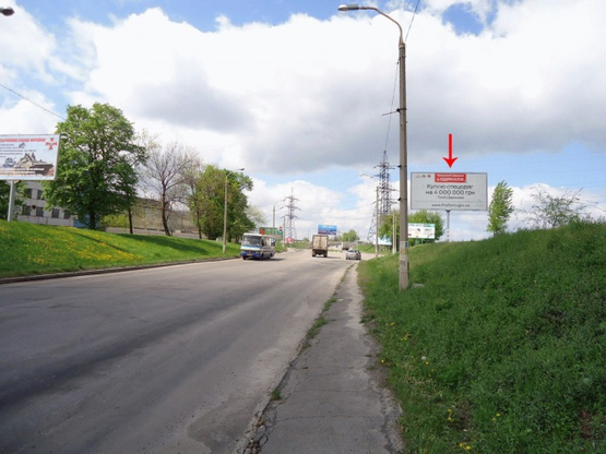 Фото рекламной плоскости по адресу вул. Січеславский шлях, з'їзд з Баглейського мосту, в центр/ул. Днепропетровская, возле съезда с Баглейского моста, в центр