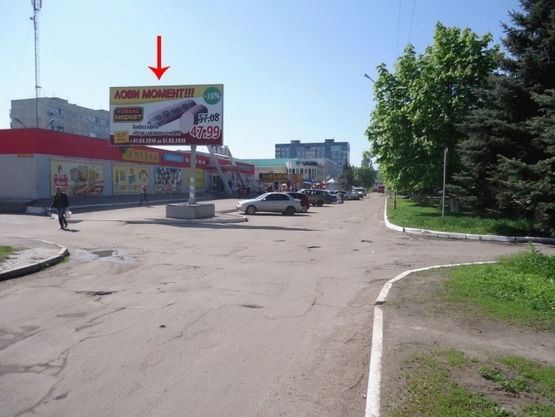Фото рекламной плоскости по адресу пр-т Шахтобудівників, 13, біля супермаркету "КАПІ" з центру/Шахтостроителей пр-т 13, возле супермаркета КАПИ, из центра