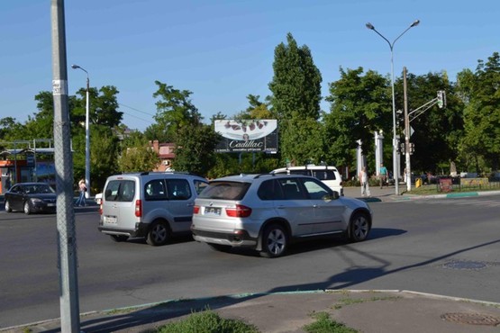 Фото рекламной плоскости по адресу перекрёсток ул.1Мая, ул.Александрийской, №09-А