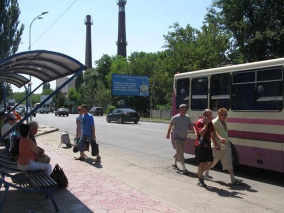 Фото рекламной плоскости по адресу ул.Победы, остановка "рынок Утренний", №24-А