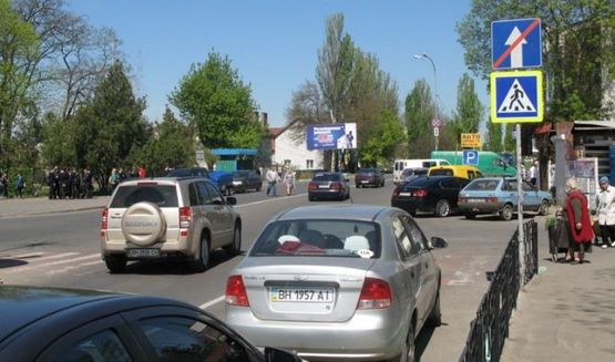 Фото рекламной плоскости по адресу ул.Победы, остановка "рынок Утренний", №25-Б