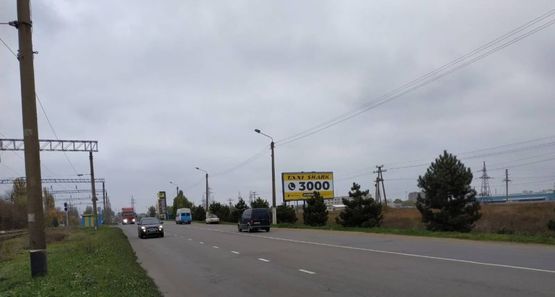 Фото рекламной плоскости по адресу ул.Промышленная, район автозаправки "БРСМ", №40-А