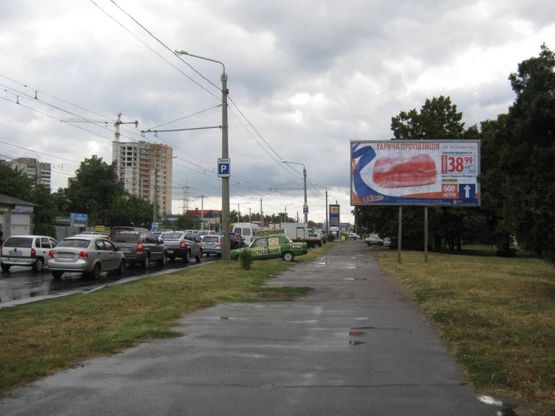 Фото рекламной плоскости по адресу ул. Комарова (Промсвязь)